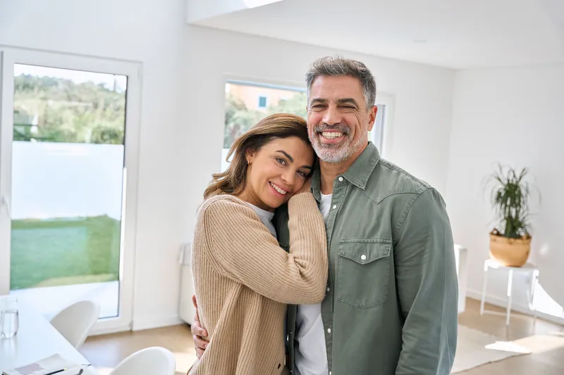 Middle-aged couple relaxing at home
