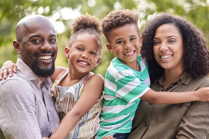 Family with kids at a neighborhood park