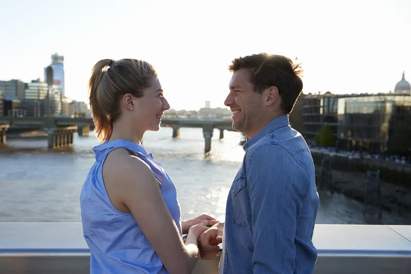 Young couple walking downtown