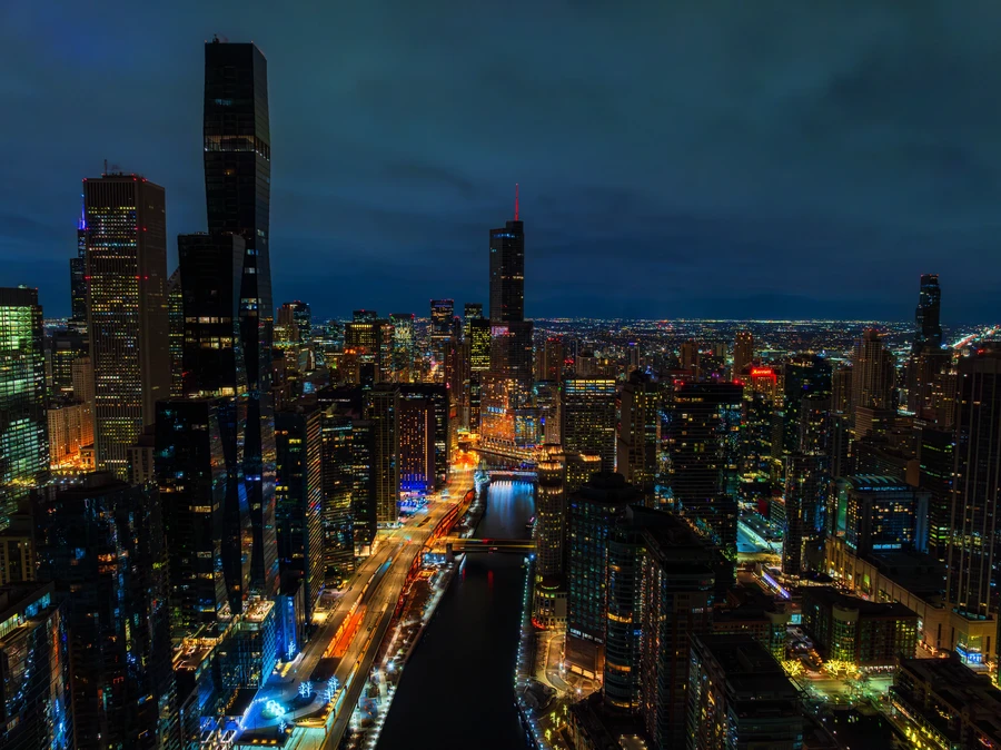 Second City sign on Wells Street with busy Chicago nightlife corridor visible